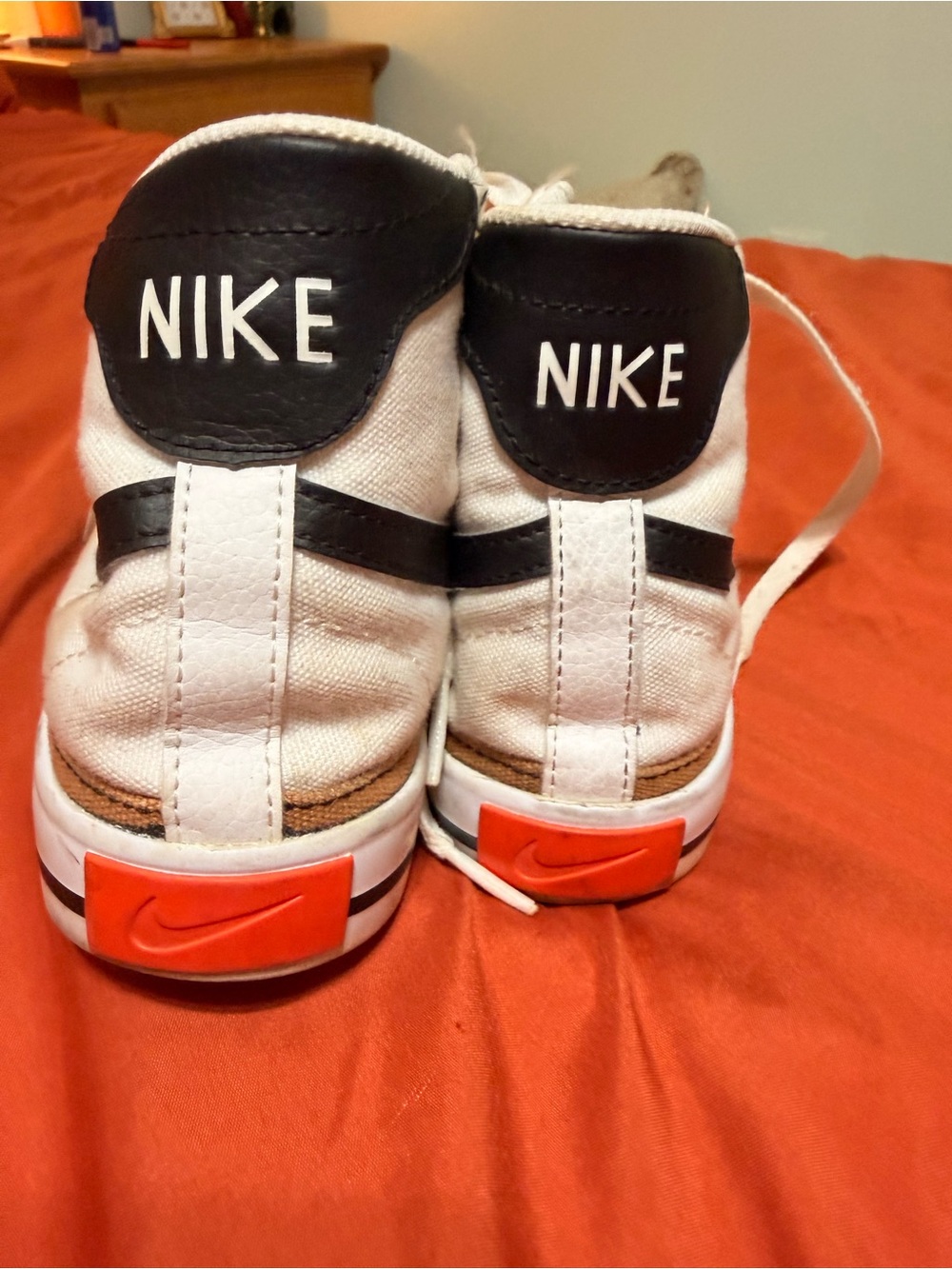 NIKE WEMONS White & Black High-Top Sneakers with Orange Accents